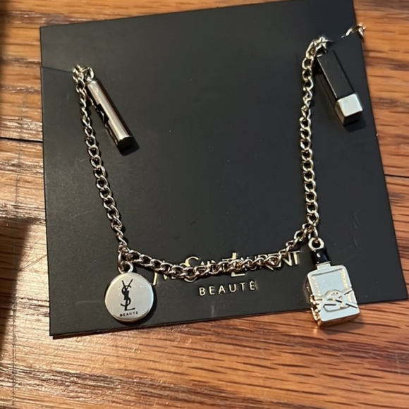 YSL Bundle of two (cosmetic pouch and bracelet) - Picture 10 of 10